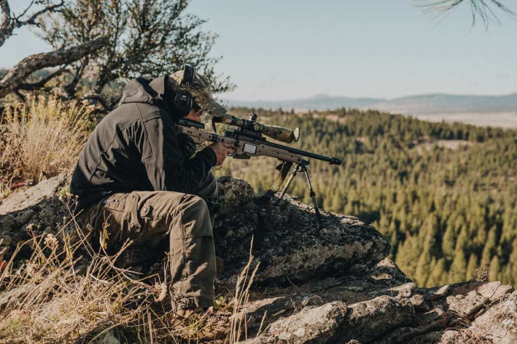 Thunder Ranch’s High Angle Rifle Training (HART) is an advanced course that pushes the boundaries of precision shooting, requiring participants to hike at high altitudes for extended periods while carrying all necessary gear. This course demands physical fitness and readiness, with packs typically weighing at least 35 pounds.

The course starts with two days on the flat range, focusing on precision shooting from ideal positions. The following two days are spent in the field, where students will engage targets from practical, often challenging shooting positions at intermediate and extended distances. The high-altitude environment adds complexity, with extreme angles and variable winds impacting performance.

Participants must bring rifles in sound working order, with no magnums allowed, and should have a 100-yard zero established with the ammunition they plan to use. Essential tools and wrenches for daily scope maintenance are required, along with a thorough reading of the scope manual. Hands-free rifle packs are highly recommended for the physical demands of the course.

Completion of the Mid-Range Rifle Course is recommended as a prerequisite to ensure preparedness for the rigorous training. Join HART to enhance your precision shooting skills and learn to navigate the unique challenges of high-angle environments.